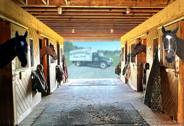 Four Horses in a stable with a Sergeantsville Grain & Feed delivery truck in the background.